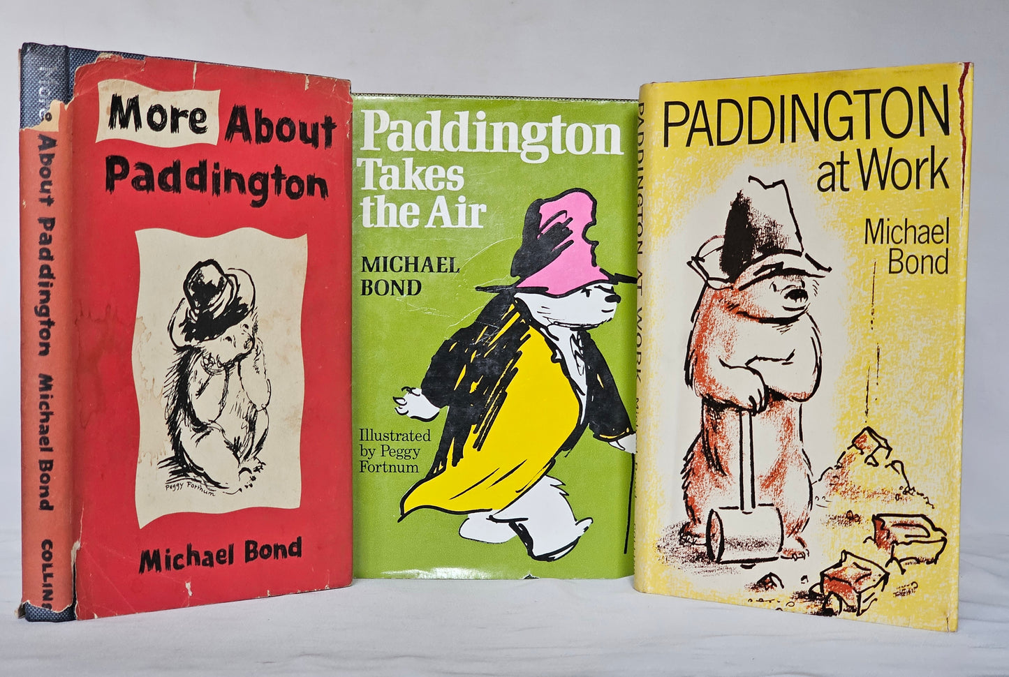 1966-76 Three Early Paddington Bear Books / Paddington at Work (1st Ed. 1966), More About Paddington (1966), Paddington Takes The Air (1976)