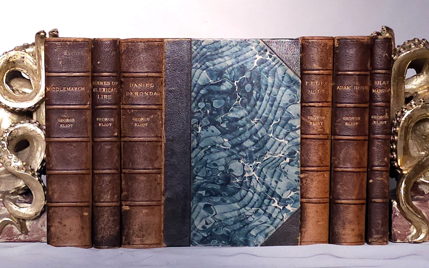 1890 The Novels of George Eliot in Six Volumes / William Blackwood, London / Bound in Leather With Blue Marbled Sides and Endpapers