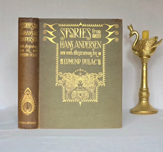 Decorative antique book in green cloth with gilt decoration, titled 'Stories from Hans Andersen' with illustrations by Edmund Dulac.
