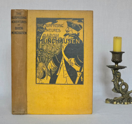 Vintage book titled 'The Surprising Adventures of Baron Munchausen' by The Medici Society