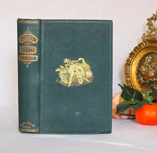 Antique book in green cloth with gilt decoration and titles saying 'Gardening For the South'