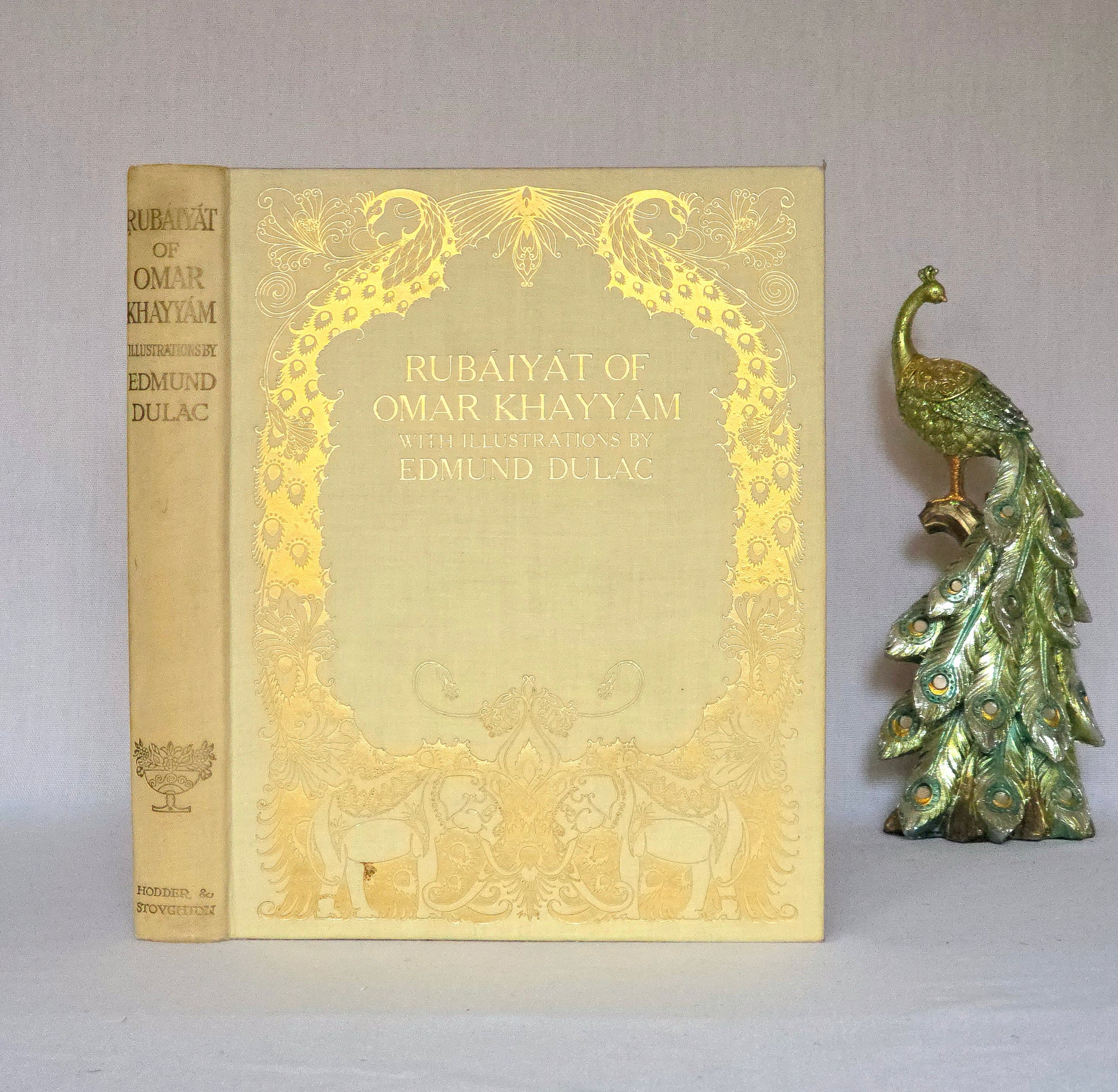 Decorative book titled 'Rubaiyat of Omar Khayyam' with an ornate cover, illustrated by Edmund Dulac.