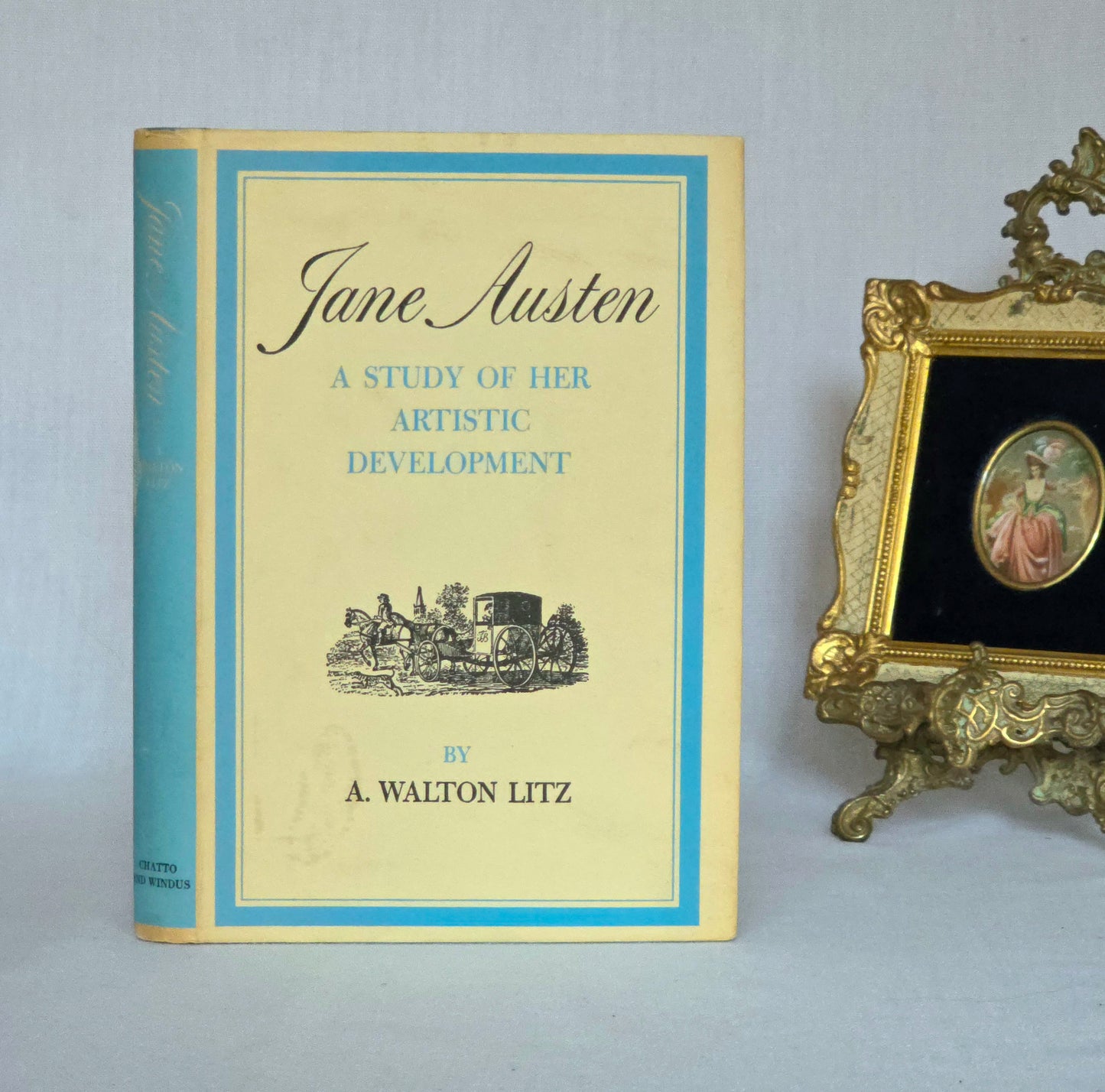 Book titled 'Jane Austen: A Study of Her Artistic Development' by A. Walton Litz on a gray background with an ornate frame.