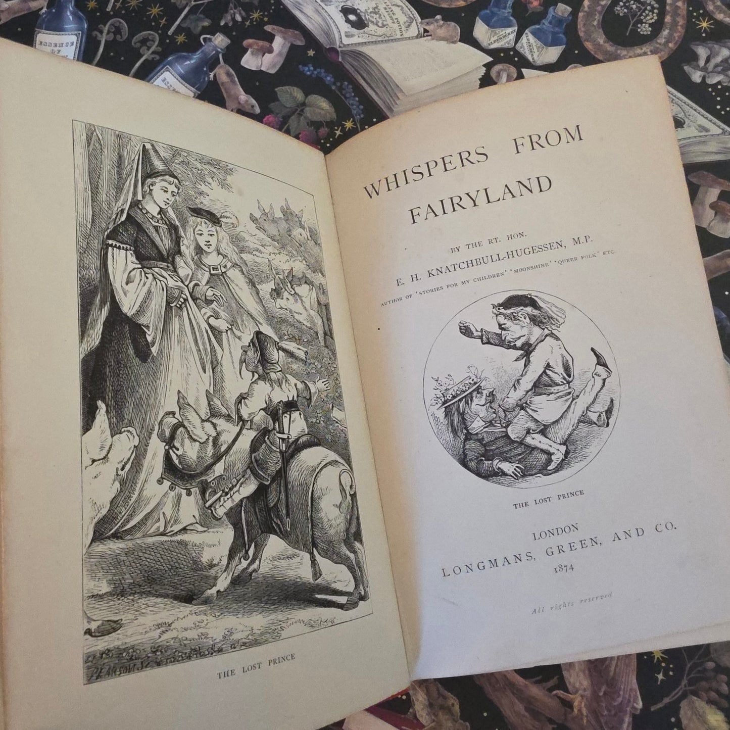 Antique book open at title page of Whispers in Fairyland and frontispiece illustration 
